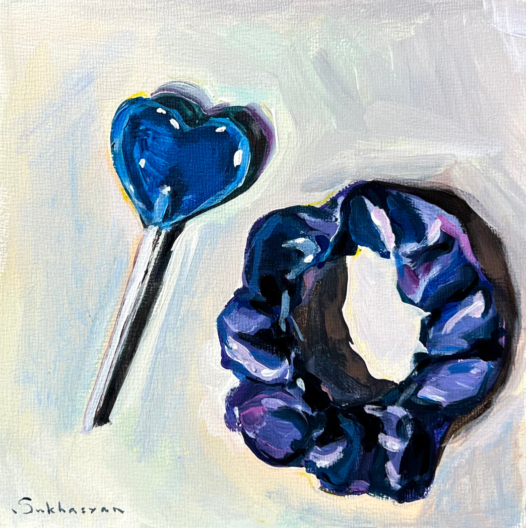 Still Life with Blue Lollipop and Hair Tie